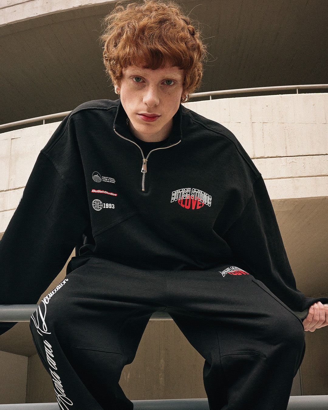 LOVE QUARTER-ZIP BLACK HOODIE