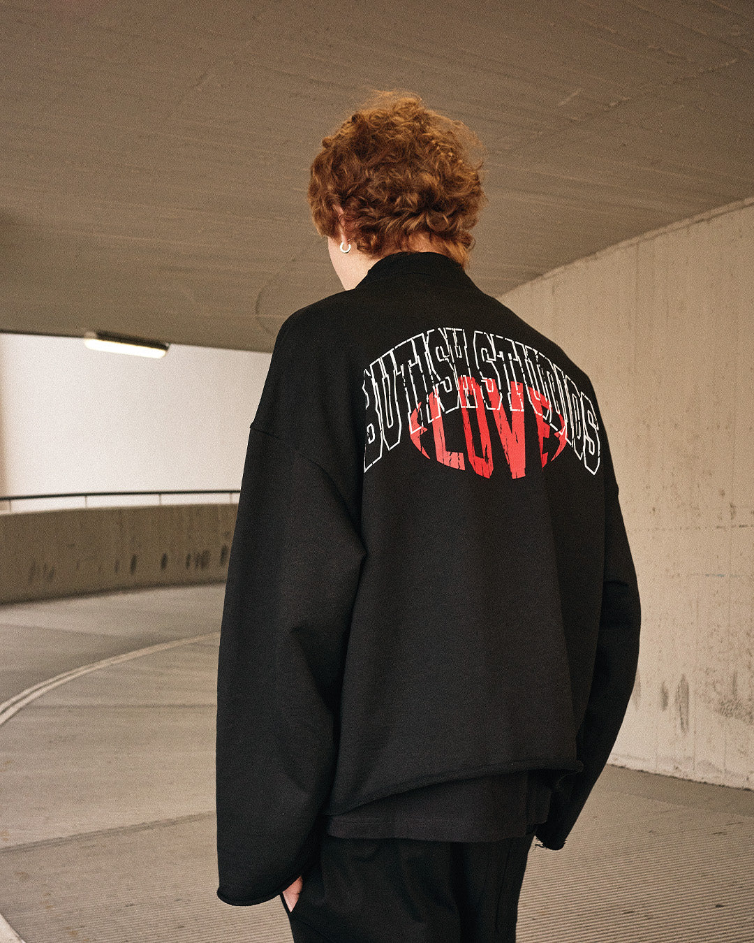 LOVE QUARTER-ZIP BLACK HOODIE