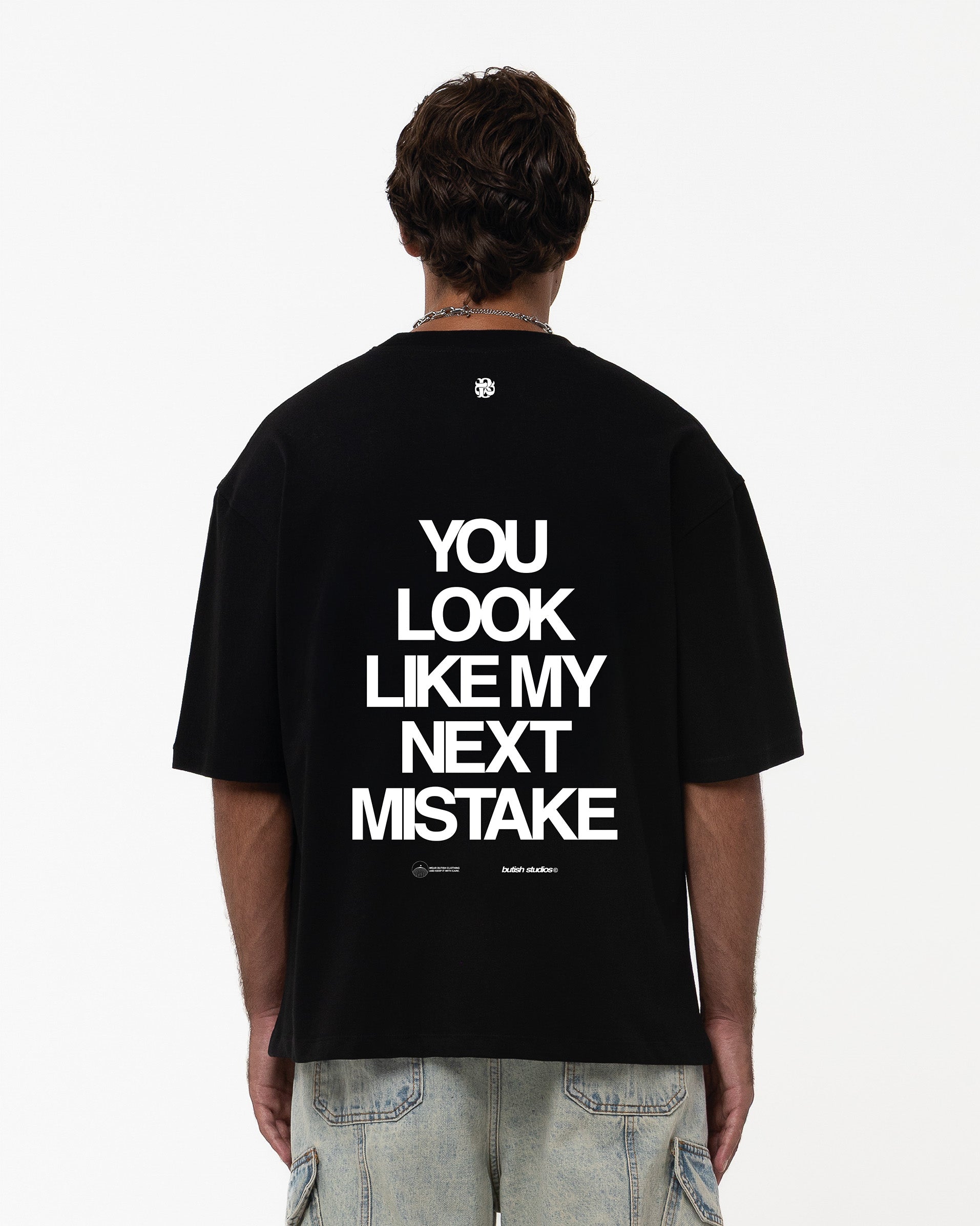 NEXT MISTAKE BLACK TEE